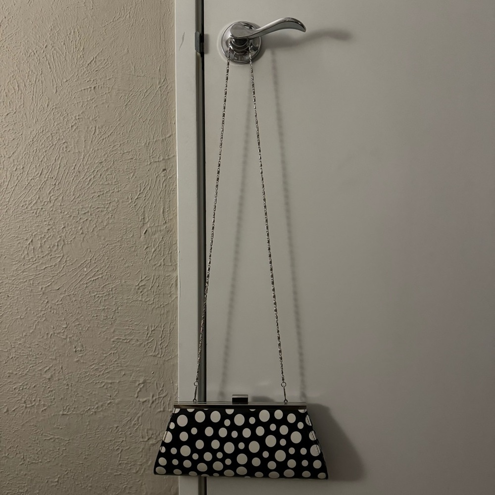 Neiman Marcus polka dot clutch with chain.